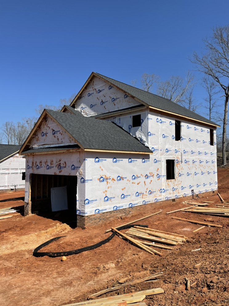 Slide of RC Roofing Contractor