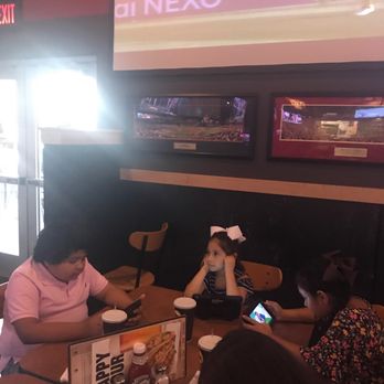 Buffalo Wild Wings - Our 4 big kids tablets and all - American Near Me - Wellington, Florida Buffalo Wild Wings - Our 4 big kids tablets and all - American Near Me - Wellington, Florida