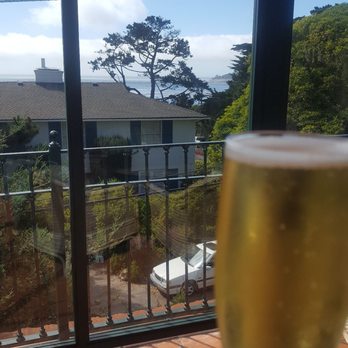 La Playa Hotel - Cheers... from the terrace patio so high up! Ocean over there.... at least a glimpse :-) - Hotels Near Me - Carmel, California