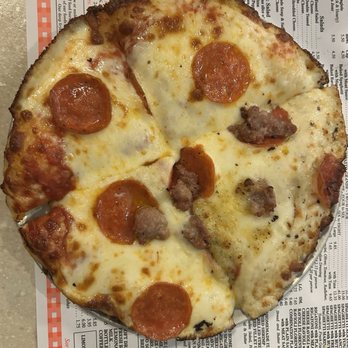 Luigi's Restaurant - Half pepperoni with red sauce and half sausage with white sauce - Pizza Near Me - Akron, Ohio Luigi's Restaurant - Half pepperoni with red sauce and half sausage with white sauce - Pizza Near Me - Akron, Ohio