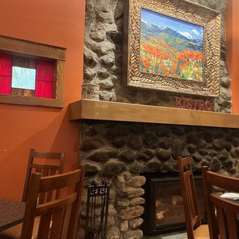 Oak Street Bistro - Fireplace and painting in main dining/bar area - American Near Me - Alfred, Maine Oak Street Bistro - Fireplace and painting in main dining/bar area - American Near Me - Alfred, Maine