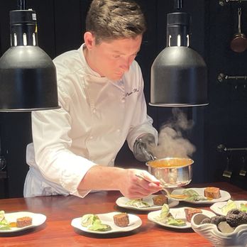 ALIAS - Executive Chef Stephen Burke expertly plating dishes. - Beer, Wine & Spirits Near Me - Warrenton, Virginia