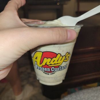 Andy's Frozen Custard - a hand holding a cup of ice cream - Ice Cream & Frozen Yogurt Near Me - Edmond, Oklahoma