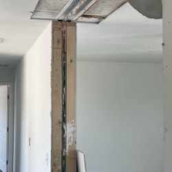 Duncan's Handyman & Cleaning Services - Before repair of drywall