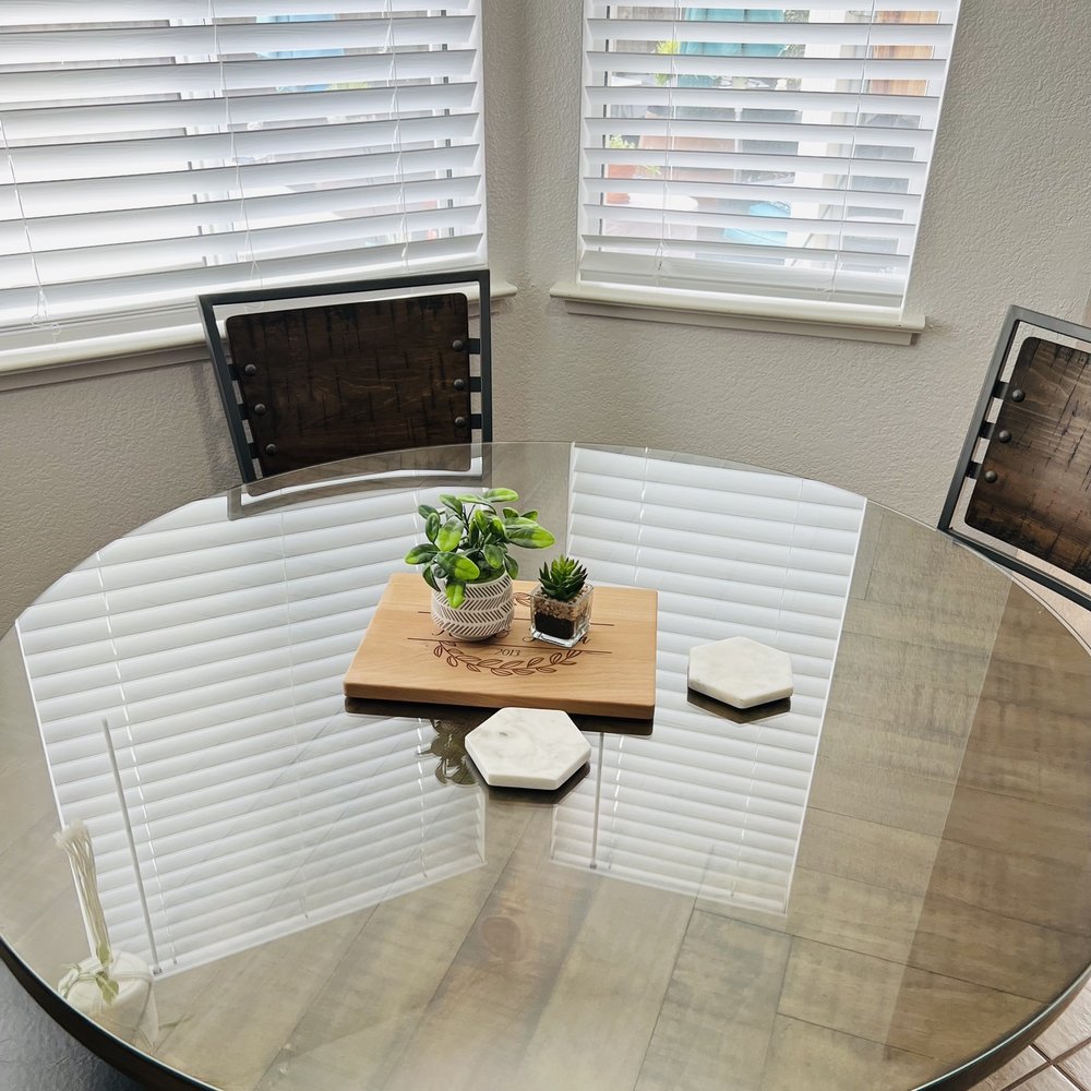 Custom made glass top for my dining table. I love it!