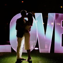 This was a surprise at the rehearsal dinner. Right when guests walked in there was a huge LOVE sign! Such a special touch. This was a surprise at the rehearsal dinner. Right when guests walked in there was a huge LOVE sign! Such a special touch.