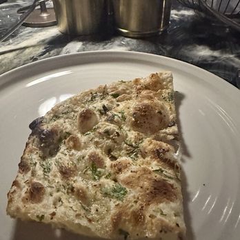 Musaafer - Garlic Naan - Indian Near Me - Houston, Texas Musaafer - Garlic Naan - Indian Near Me - Houston, Texas
