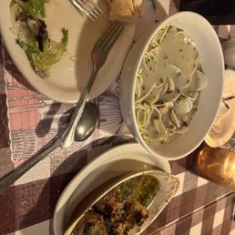 Steamed clam and mushroom escargot appetizers with almost all eaten salad...lol Steamed clam and mushroom escargot appetizers with almost all eaten salad...lol