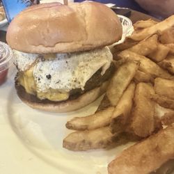 BucketHead Tavern - Tavern Burger (Hang Over Cure) burger with egg and cheese, side of fries.  Delicious.