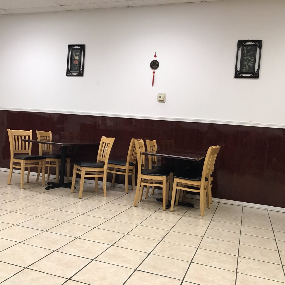 tables and chairs in a restaurant tables and chairs in a restaurant
