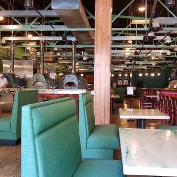 The Upper Crust - Dining area with wood fired ovens in the background - Pizza Near Me - Gettysburg, Pennsylvania