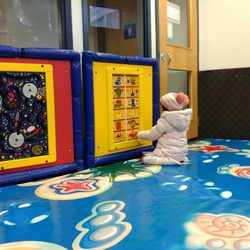 Vancouver Public Library - Kerrisdale - Kid's Recreation Room has padded floors and activity stations on the walls.
