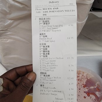 Peking Restaurant - a person holding a receipt - Chinese Near Me - Midlothian, Virginia Peking Restaurant - a person holding a receipt - Chinese Near Me - Midlothian, Virginia
