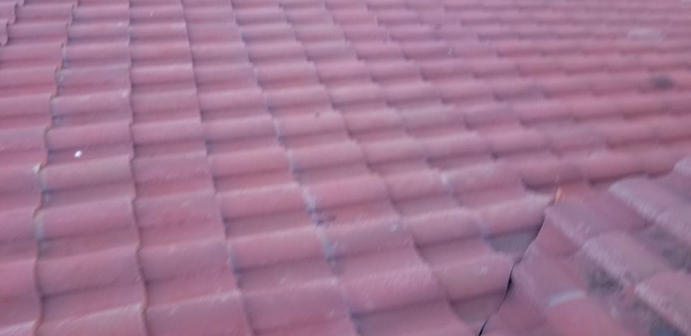 Slide of Luna Roofing