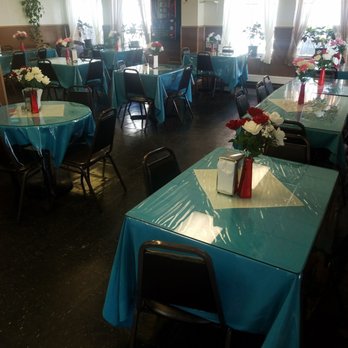 Jhoandra Restaurant - tables and chairs with blue tablecloths - American Near Me - Philadelphia, Pennsylvania Jhoandra Restaurant - tables and chairs with blue tablecloths - American Near Me - Philadelphia, Pennsylvania