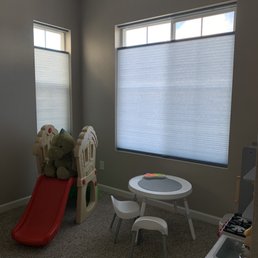 Cellular light filtering shades. We love that these can raise from top or bottom