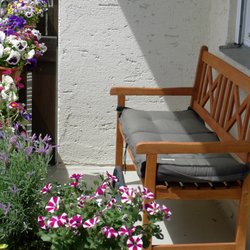 American Chiropractic - Auf unserem sonnigen Wartezimmerbalkon