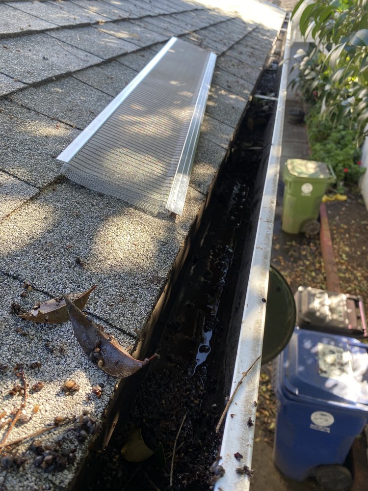 Slide of New Roof Repair Gutters