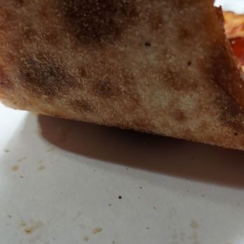 Papa Leone's Pizzeria - Under side of requested a little well done pizza looks perfect - Pizza Near Me - Sevierville, Tennessee Papa Leone's Pizzeria - Under side of requested a little well done pizza looks perfect - Pizza Near Me - Sevierville, Tennessee