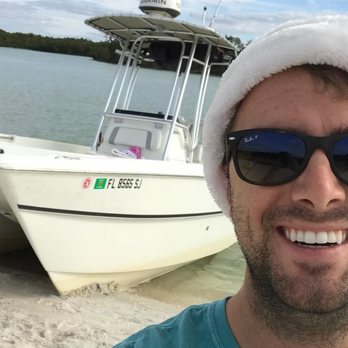 Naples Bay Marina - Blake (one of our terrific salesmen) enjoying the day! - Boat Repair Near Me - Naples, Florida