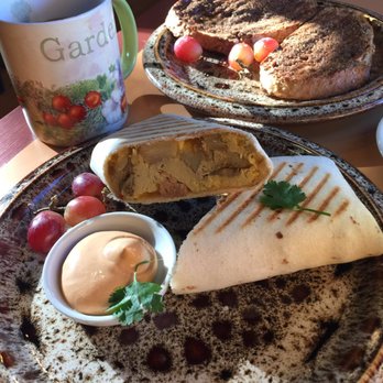 Roots Farm Cafe - Breakfast burrito /w sausage and dipping sauce (front), Fancy toast (rear) - Coffee & Tea Near Me - Tijeras, New Mexico Roots Farm Cafe - Breakfast burrito /w sausage and dipping sauce (front), Fancy toast (rear) - Coffee & Tea Near Me - Tijeras, New Mexico