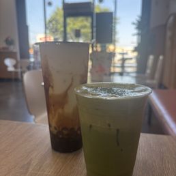 Brown sugar boba milk with vanilla cream top, Matcha latte Brown sugar boba milk with vanilla cream top, Matcha latte