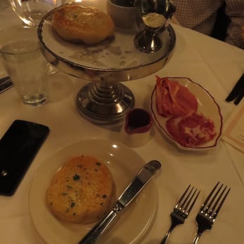 Marcel - Bread service. Griddled bread with garlic butter, olives and chilies, ricotta, cured meats. - Steakhouses Near Me - Atlanta, Georgia