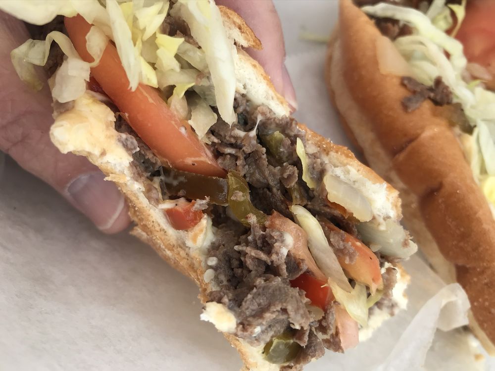 Sunset Subs and Steak Logo
