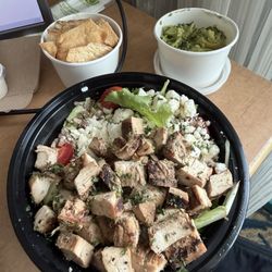 Health Tree Cafe - Mediterranean bowl with a side of avocado and pita chips.