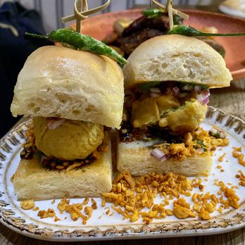 Kanyakumari - Samrat Vada Pav - from Mumbai -- spicy potato filling inside bread, Bombay's favorite street snack. - Seafood Near Me - New York, New York Kanyakumari - Samrat Vada Pav - from Mumbai -- spicy potato filling inside bread, Bombay's favorite street snack. - Seafood Near Me - New York, New York