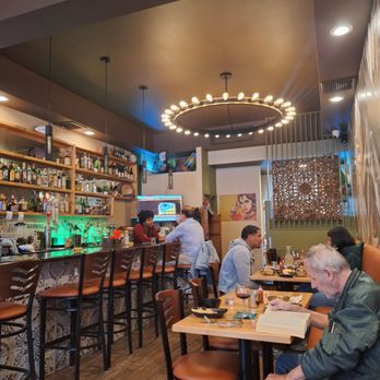 Neem Indian Cuisine - The bar and some tables - Indian Near Me - Bronx, New York