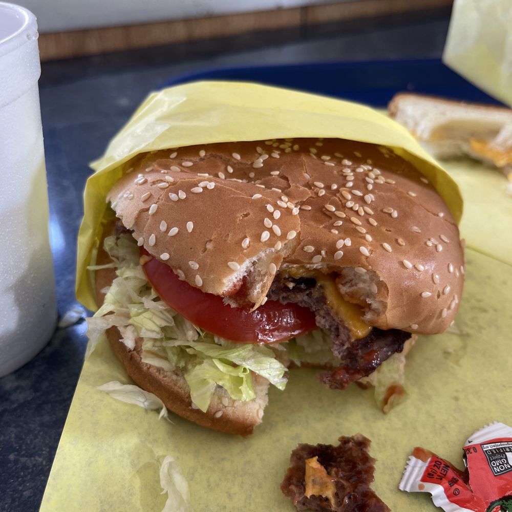 a half eaten hamburger