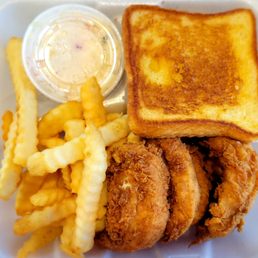 Guthrie's "Box". Five tenders, fries, slaw and toast. Guthrie's Signature  sauce for the tenders is included.