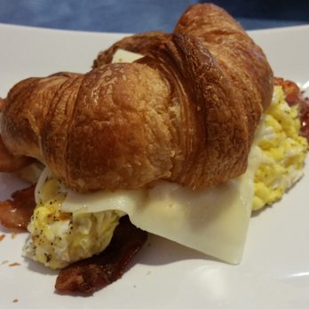 Flying With Jerome - Bacon, egg and cheese croissant. - Breakfast & Brunch Near Me - Clearwater, Florida Flying With Jerome - Bacon, egg and cheese croissant. - Breakfast & Brunch Near Me - Clearwater, Florida