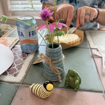 Small Batches Cafe & Collective - Cute details at every table include fresh flowers and adorable salt and pepper shakers! - Coffee & Tea Near Me - Fort Walton Beach, Florida Small Batches Cafe & Collective - Cute details at every table include fresh flowers and adorable salt and pepper shakers! - Coffee & Tea Near Me - Fort Walton Beach, Florida