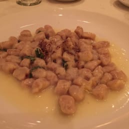 Fig gnocchi in a butter sage sauce, topped with shaved truffle cheese Fig gnocchi in a butter sage sauce, topped with shaved truffle cheese