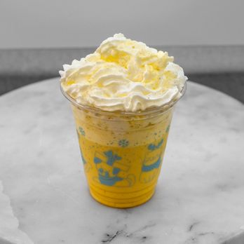 Chaivio - a yellow drink with whipped cream on top - Coffee & Tea Near Me - New York, New York Chaivio - a yellow drink with whipped cream on top - Coffee & Tea Near Me - New York, New York