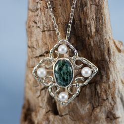 Opalus of Rochester - Handmade filigree and freshwater pearl with green starstone (chlorastrolite), Resolute origin