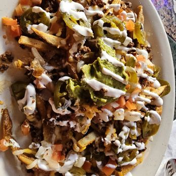 Retro Restaurant & Lounge - We ordered nachos and asked them to put it on their homemade fries! So good! - New American Near Me - Seattle, Washington Retro Restaurant & Lounge - We ordered nachos and asked them to put it on their homemade fries! So good! - New American Near Me - Seattle, Washington