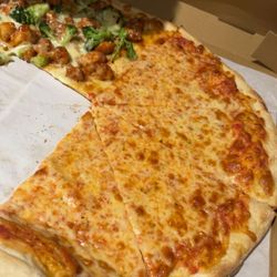 Tuscanero's Pizza - Half and half with sesame chicken pizza - yummm