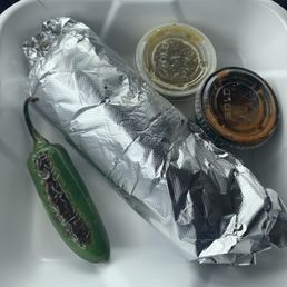 Each burrito comes standard with a whole grilled Jalepeno, and two salsas! Each burrito comes standard with a whole grilled Jalepeno, and two salsas!