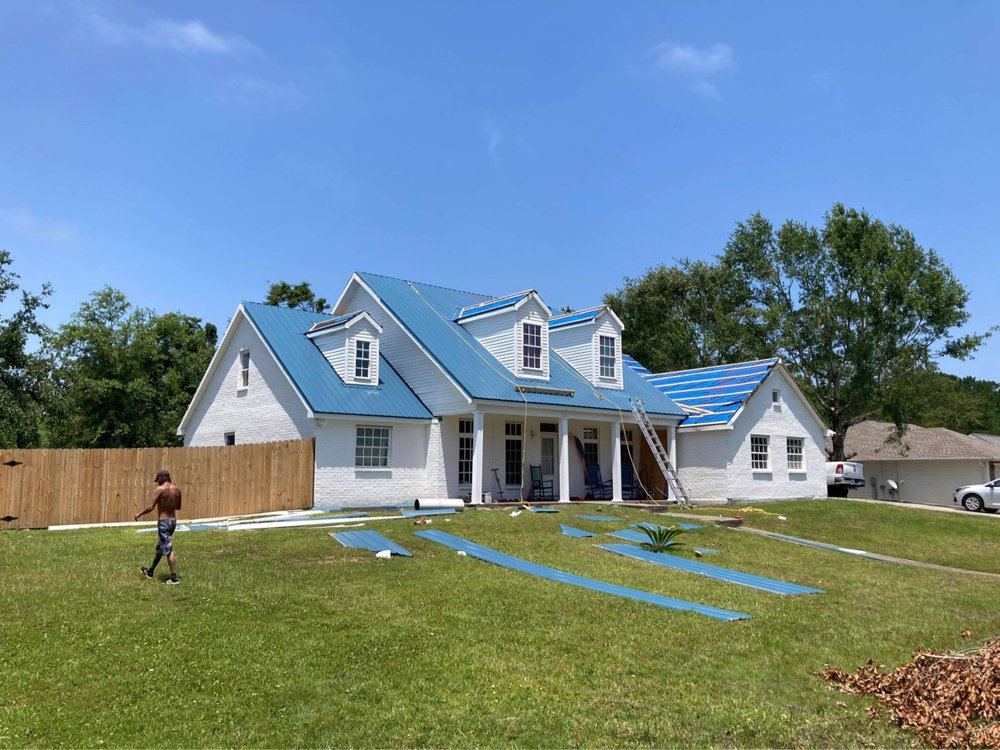Slide of Spencer Roofing Solutions
