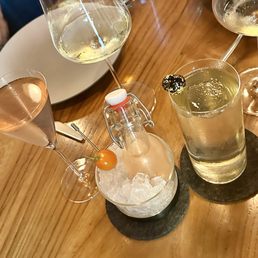 Tomato martini (left + middle) and Hibiki highball with pear and gold flakes Tomato martini (left + middle) and Hibiki highball with pear and gold flakes