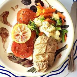 Hanover Lobster & Seafood - Baked cod with lemon and tomato served with a baked potato and a medley of vegetables.
