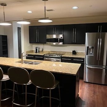 The Mayo Hotel - Island with seating in the kitchenette - Hotels Near Me - Tulsa, Oklahoma The Mayo Hotel - Island with seating in the kitchenette - Hotels Near Me - Tulsa, Oklahoma