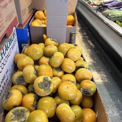 Capitol Market - Plump persimmons remind me of my grandma!