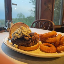 8 oz. blue/mushroom burger with onion rings. Solid! 8 oz. blue/mushroom burger with onion rings. Solid!