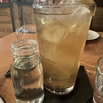 Nancy's Hustle - In-house brewed iced tea and simple syrup - New American Near Me - Houston, Texas