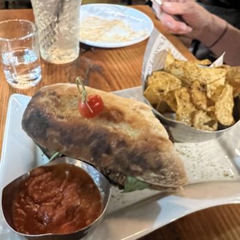 Chuckanut Bay Distillery - Eggplant sandwich with homemade potato chips. - Distilleries Near Me - Bellingham, Washington
