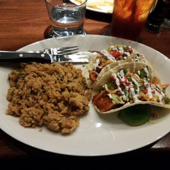 Houlihans - So. California Fish Tacos with pineapple charred rise. - American Near Me - Denton, Texas Houlihans - So. California Fish Tacos with pineapple charred rise. - American Near Me - Denton, Texas